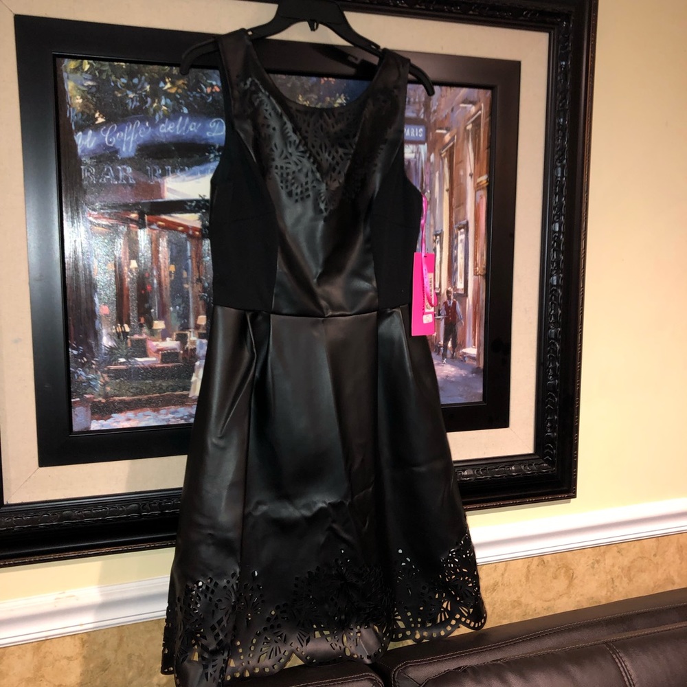 Black faux leather dress with cut out design